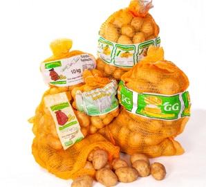 Mehrere Säcke mit gelben festkochenden Kartoffeln